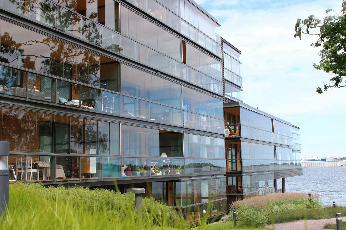 Безрамное панорамное остекление домов